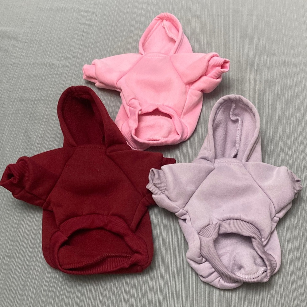 Set of Three Dog Hoodies - Pink, Red, and Lavender made from comfy fleece.